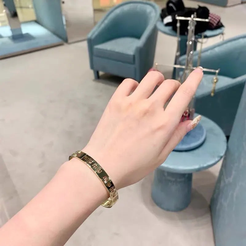 Miu Miu Logo Cuff Bracelet - Hình 3