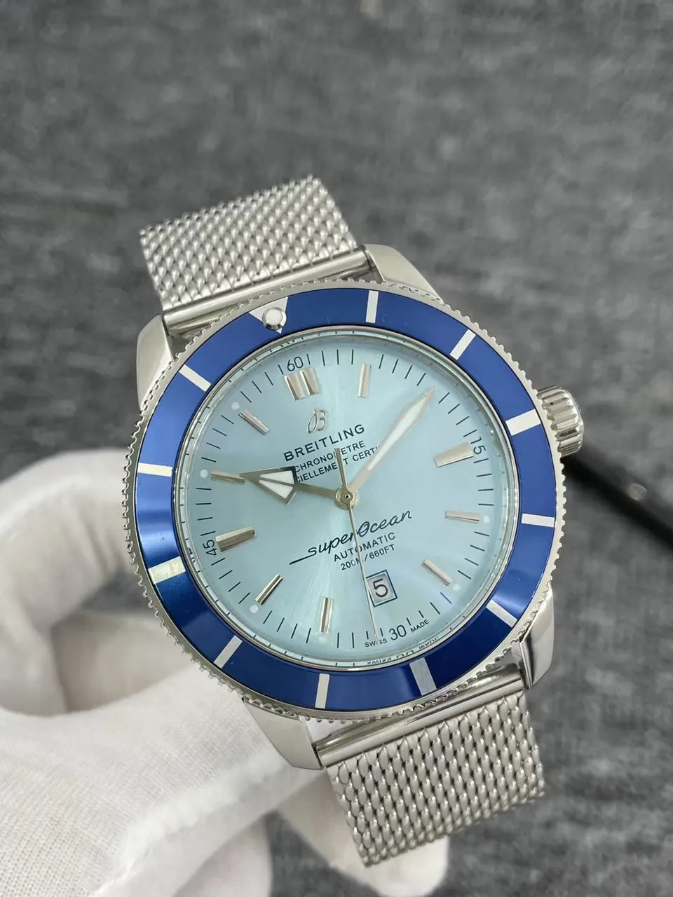 Breitling Blue Bezel Silver Mesh