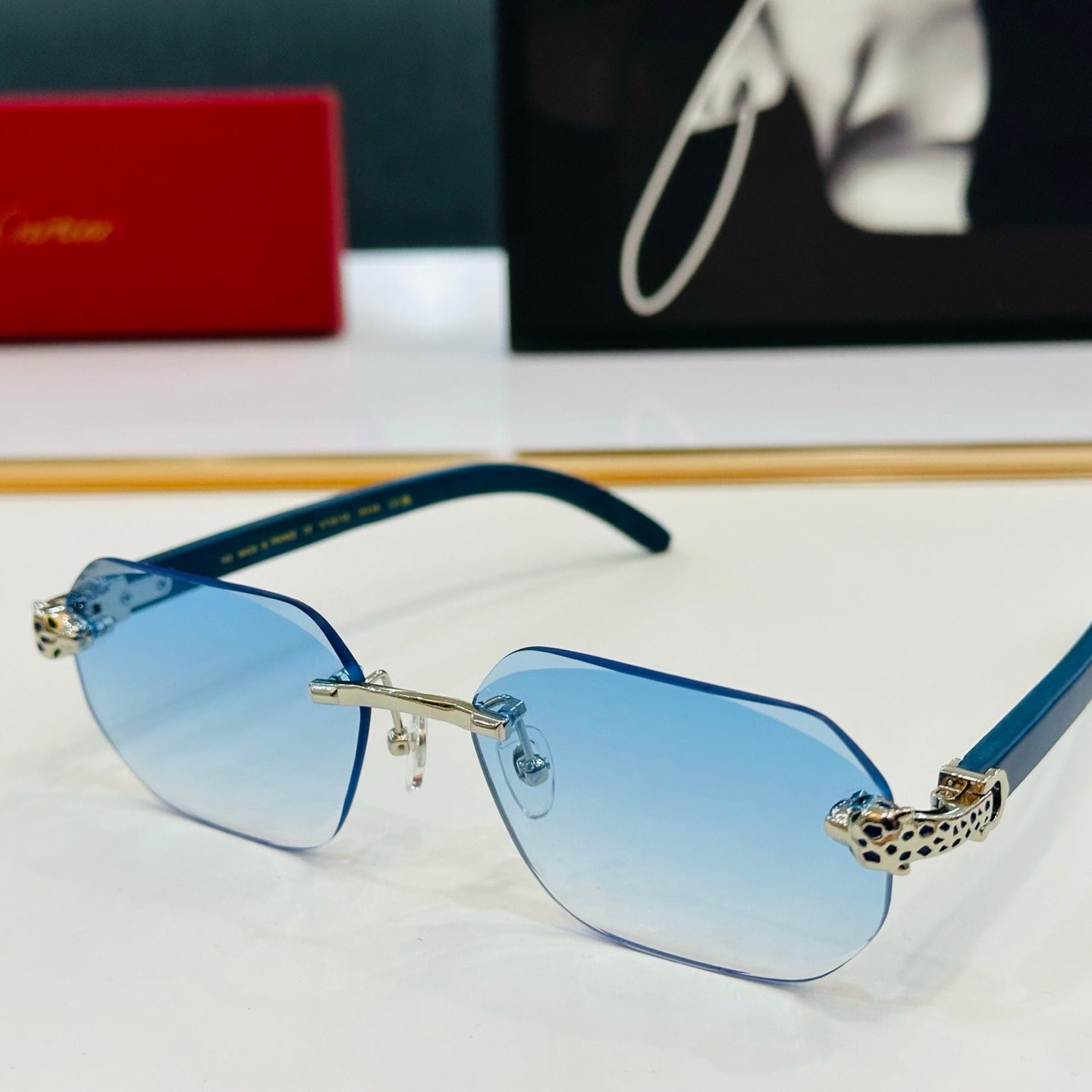 PANTHÈRE RIMLESS OVAL FRAME SUNGLASSES 543637 IN METAL