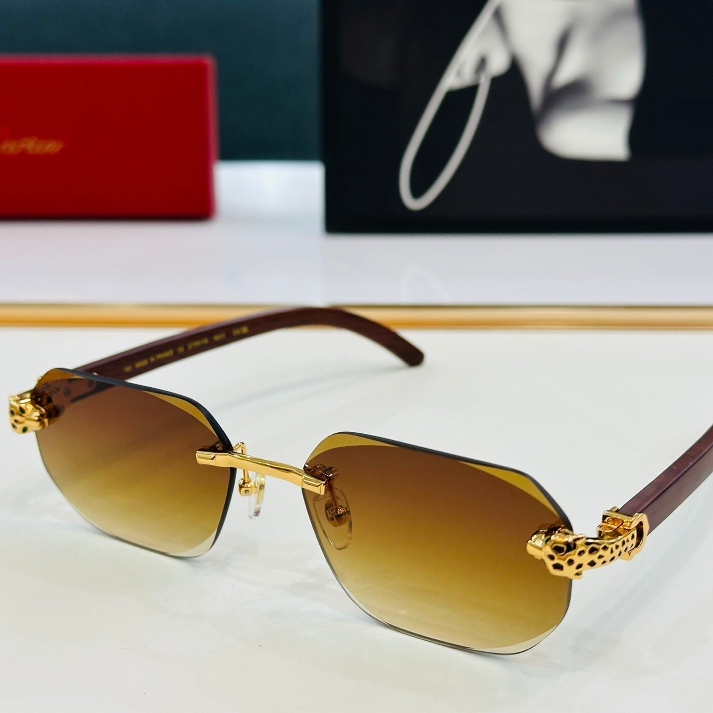 PANTHÈRE RIMLESS OVAL FRAME SUNGLASSES 543637 IN METAL
