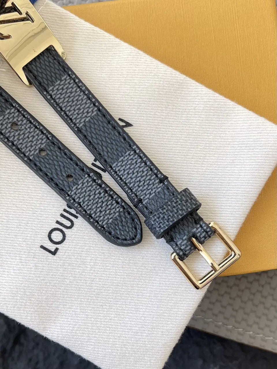 Luxury LV Damier Ebene Leather Bracelet on wrist - Hình 6