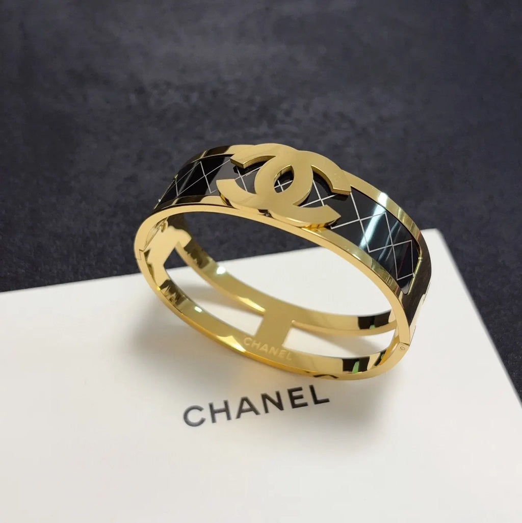 Silver-Tone Logo Bracelet on Wrist - Hình 4