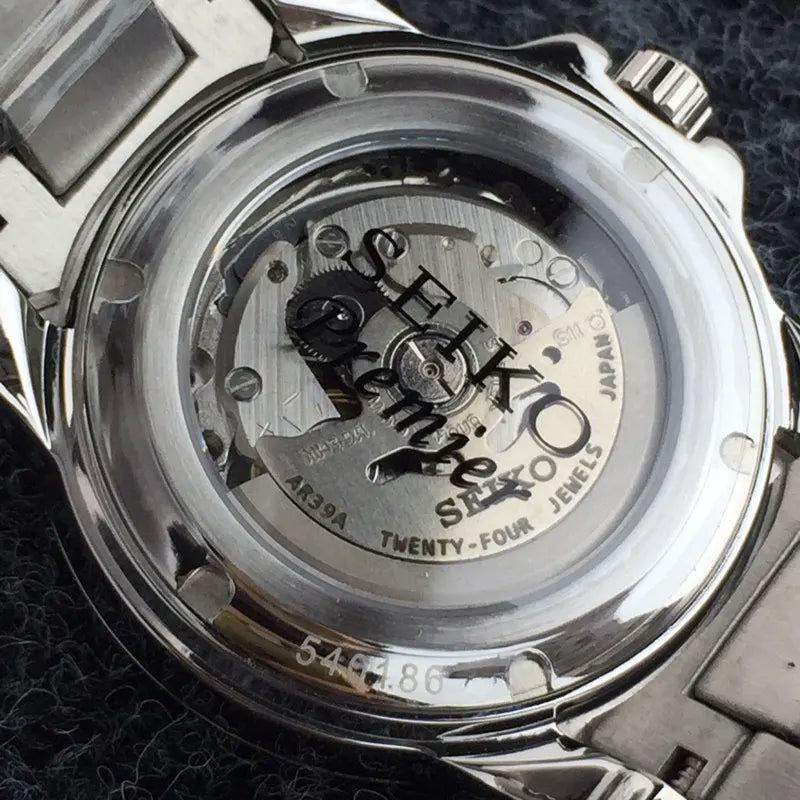 two Seiko Premier Open Heart